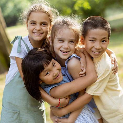 group-of-asian-and-caucasian-kids-having-fun-in-th-SZEZPJ2